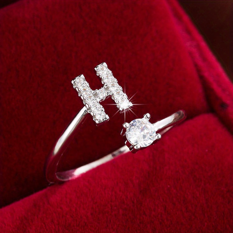 Nova – Modern open ring with initial and cubic zirconias