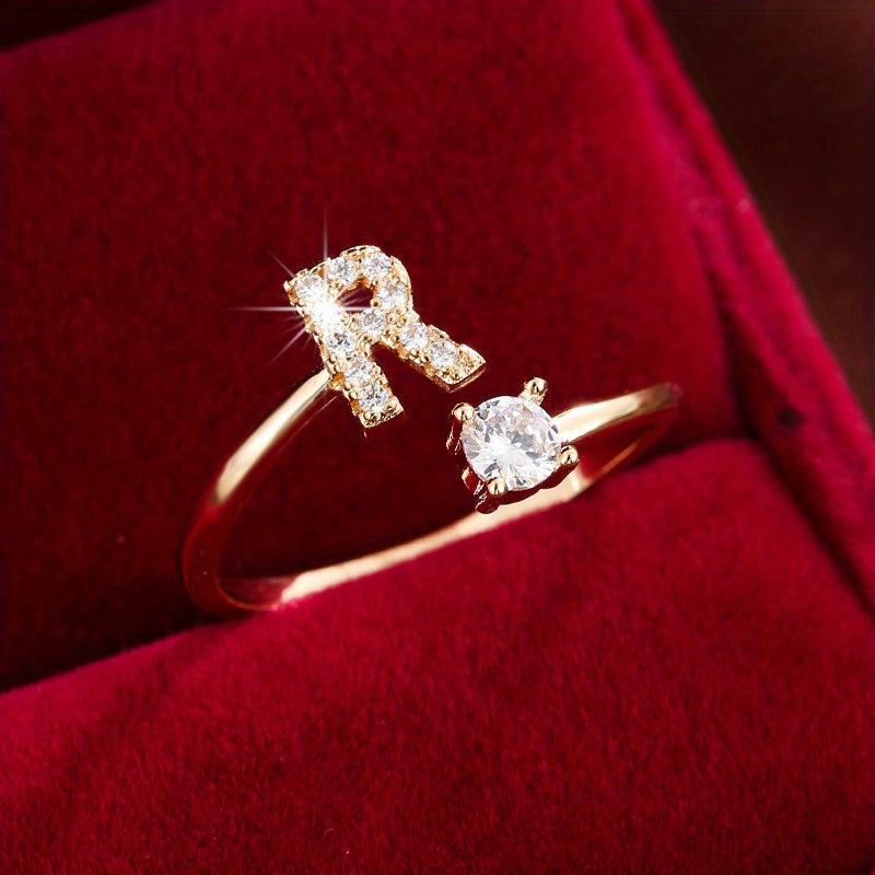 Nova – Modern open ring with initial and cubic zirconias