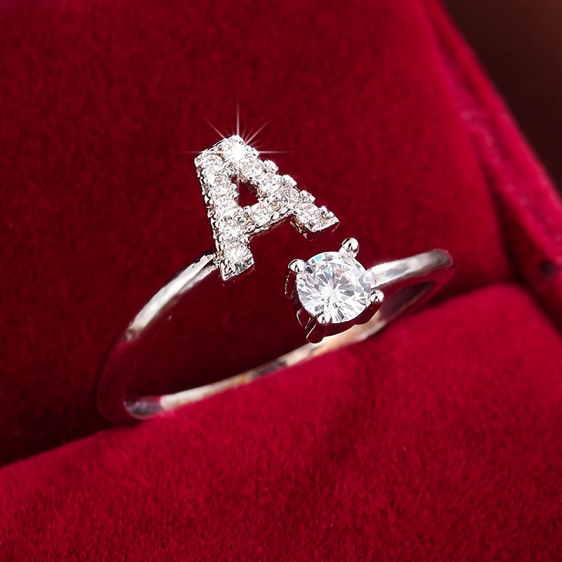Nova – Modern open ring with initial and cubic zirconias