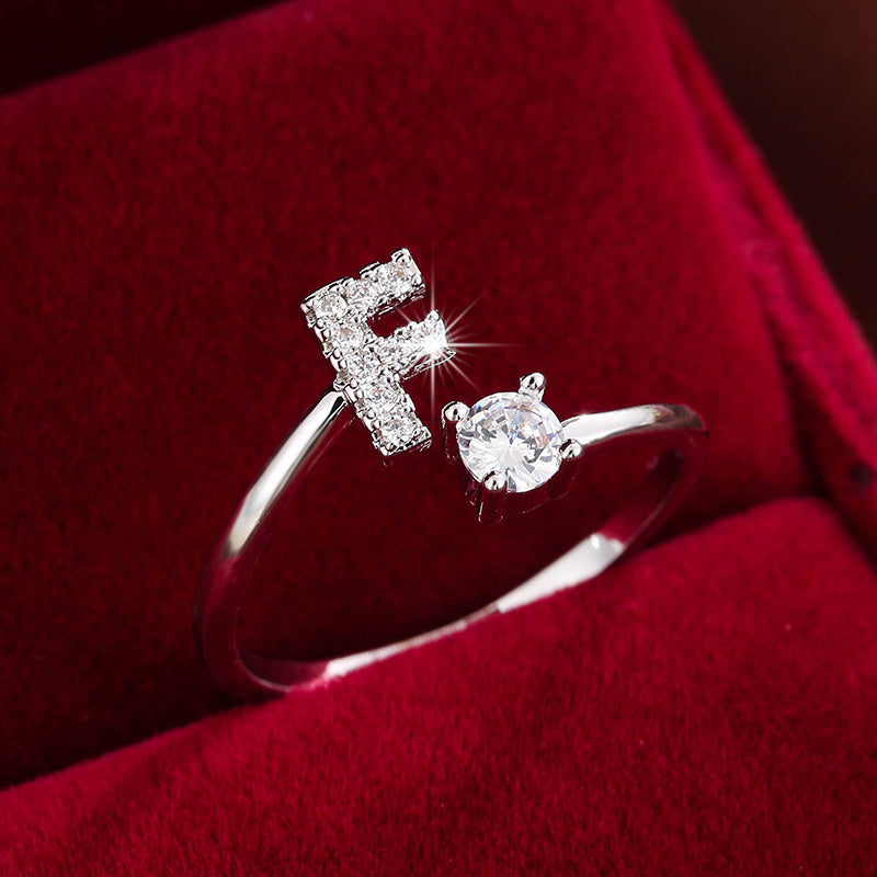 Nova – Modern open ring with initial and cubic zirconias