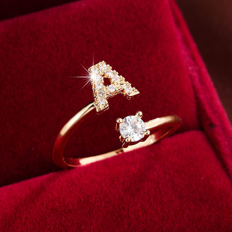Nova – Modern open ring with initial and cubic zirconias