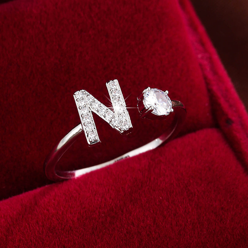 Nova – Modern open ring with initial and cubic zirconias