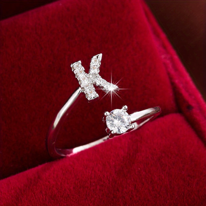 Nova – Modern open ring with initial and cubic zirconias