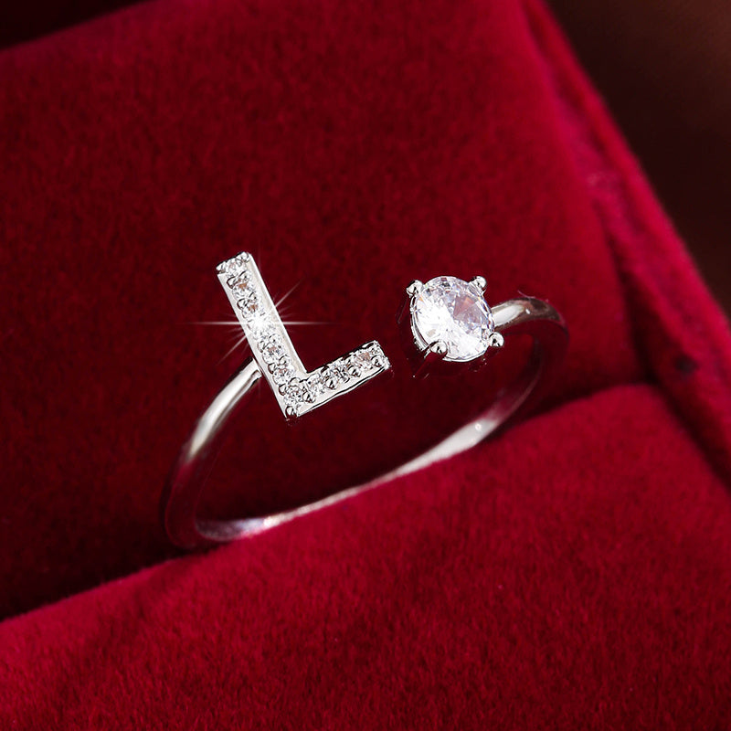 Nova – Modern open ring with initial and cubic zirconias