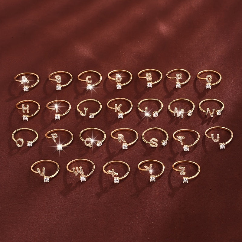 Nova – Modern open ring with initial and cubic zirconias