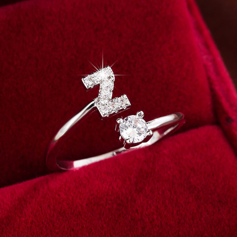 Nova – Modern open ring with initial and cubic zirconias