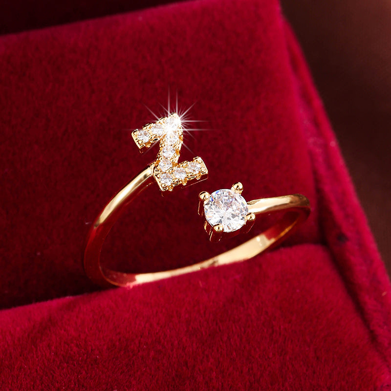 Nova – Modern open ring with initial and cubic zirconias
